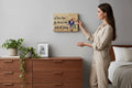 TK Wood Designs wooden sign with "I love him, he loves me, end of story" text and carved birds and hearts.
