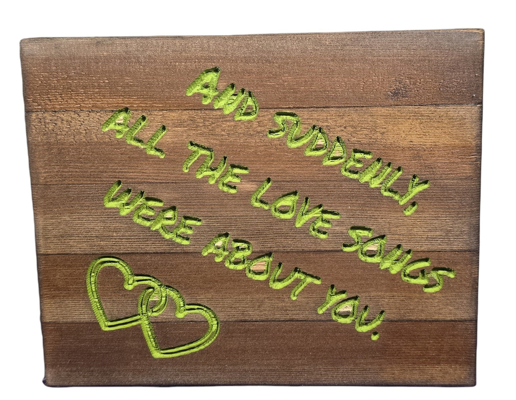 TK Wood Designs rustic wood sign with carved green lettering