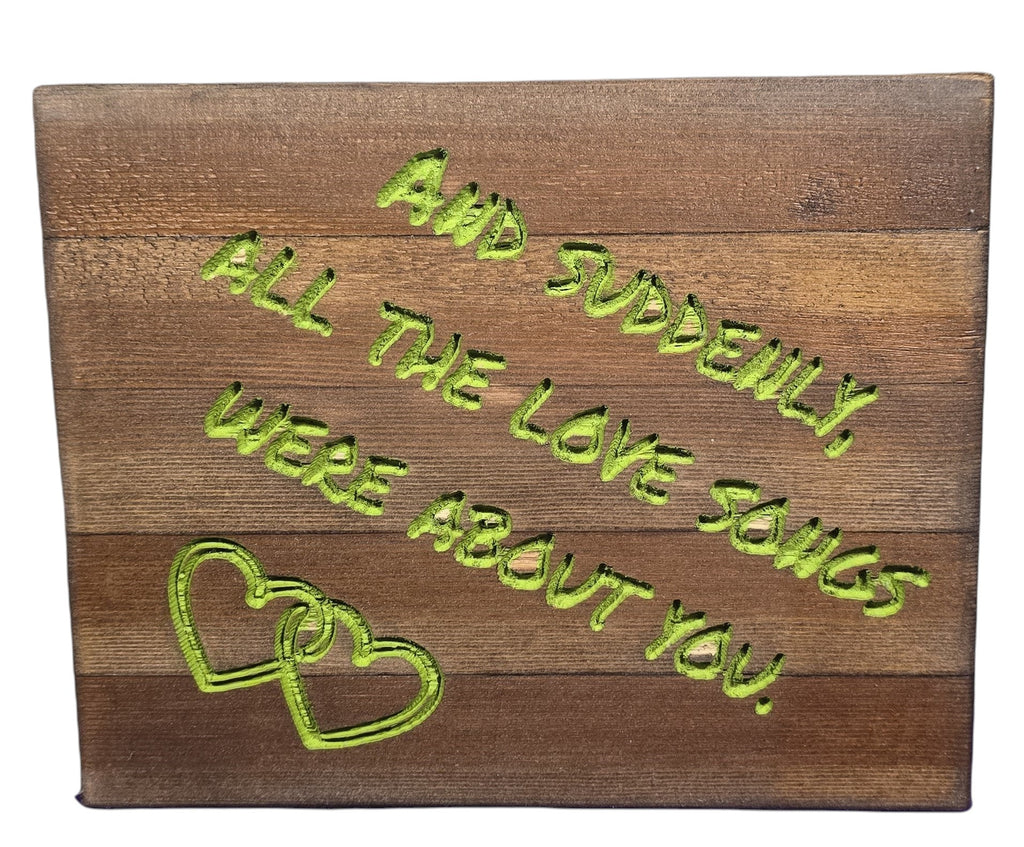 TK Wood Designs rustic wood sign with carved green lettering