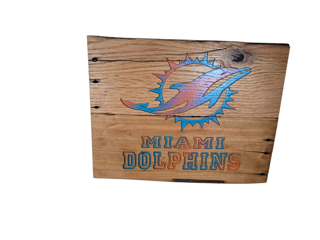 TK Wood Designs handcrafted rustic wooden wall sign featuring the Miami Dolphins logo in aqua and orange.