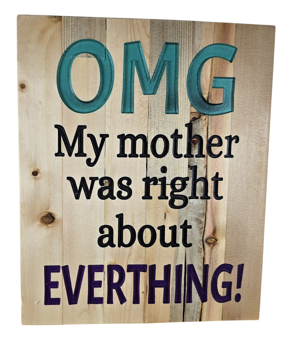 TK Wood Designs natural wood sign with raised teal "OMG", black text "My mother was right about", and purple text "EVERTHING!".