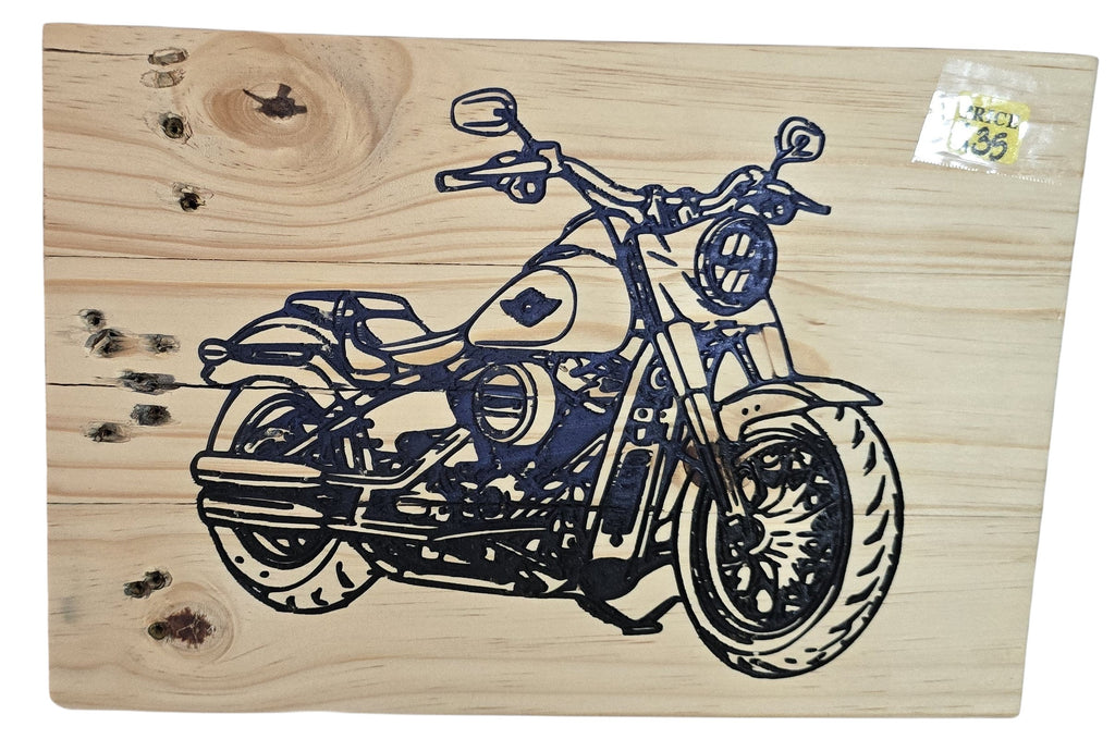 TK Wood Designs natural wood wall art featuring a detailed black silhouette of a classic motorcycle. Rustic design.