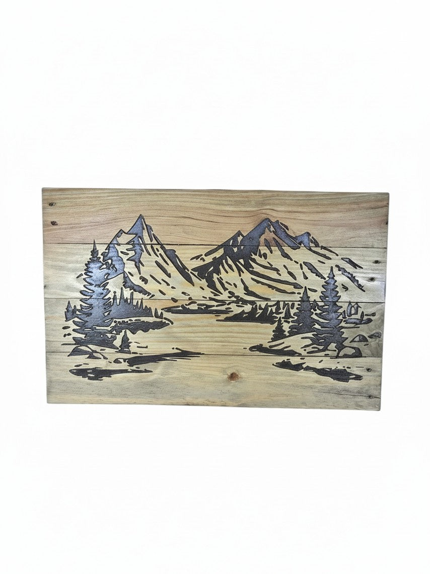 TK Wood Designs rustic wooden sign featuring a laser-engraved mountain and pine forest landscape on natural wood planks