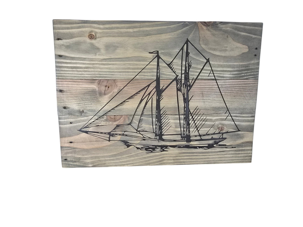 TK Wood Designs handcrafted nautical sailboat wall art featuring a detailed ship illustration on rustic weathered wood.