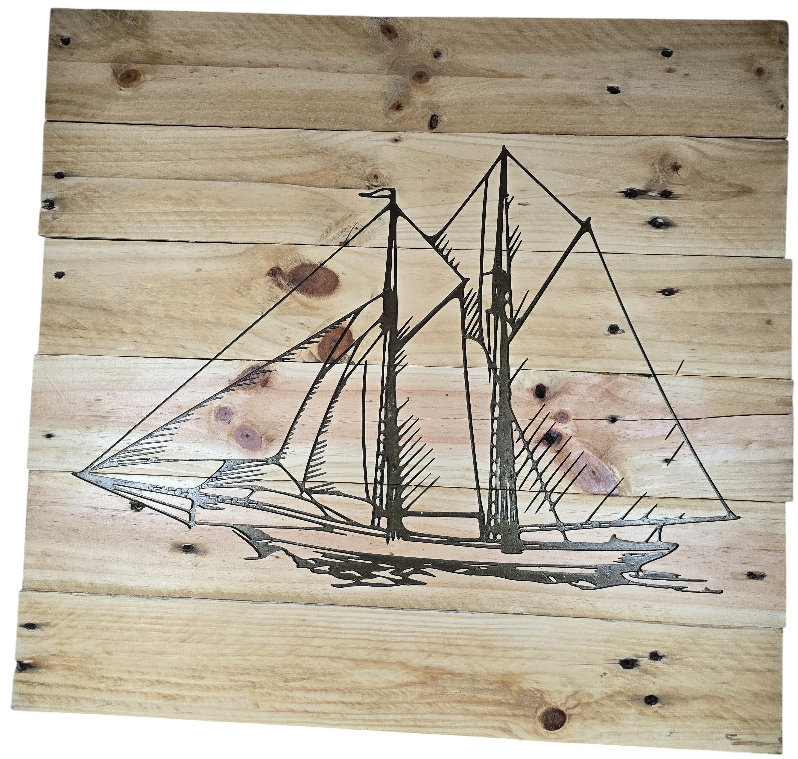 TK Wood Designs natural wood wall art featuring an etched sailboat design. Rustic, coastal decor.