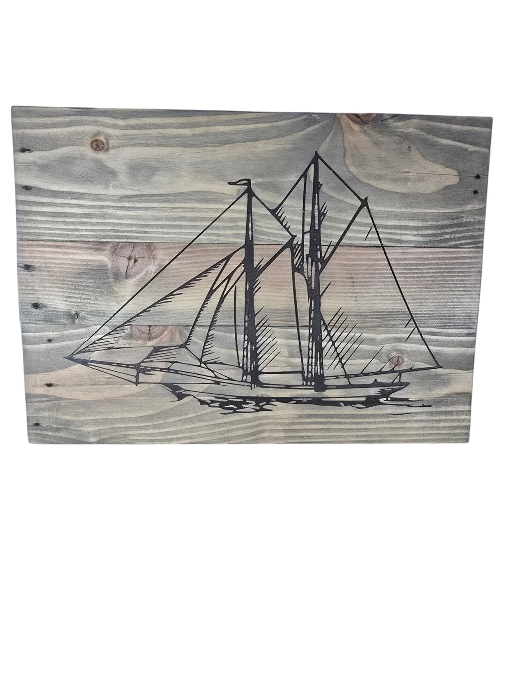 TK Wood Designs handcrafted rustic wooden wall art featuring a detailed black sailboat illustration on weathered wood.