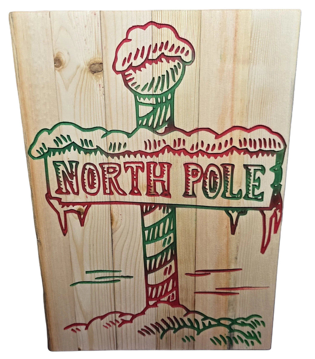 TK Wood Designs North Pole rustic reclaimed wood Christmas sign, hand-painted with red and green accents.