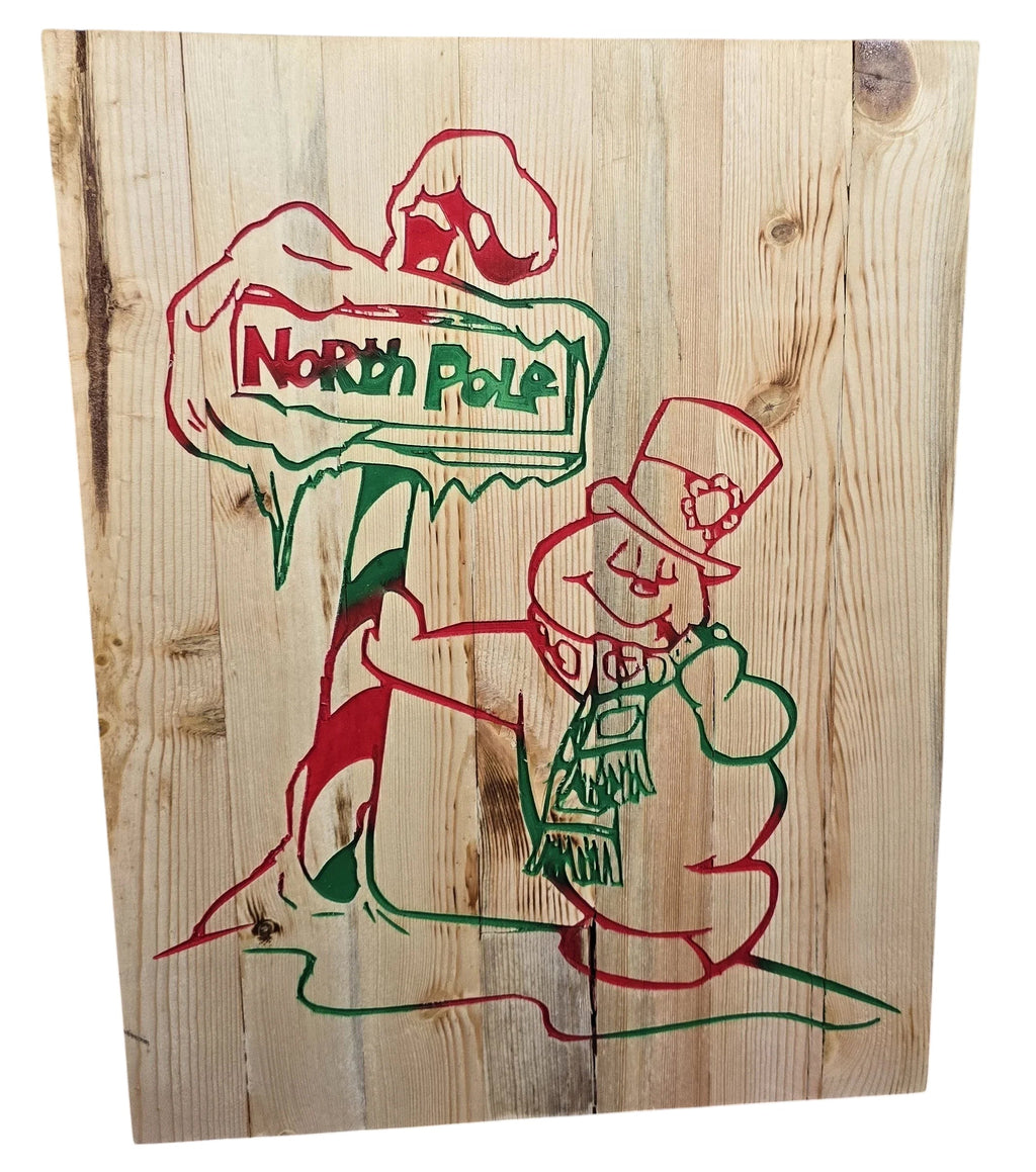 TK Wood Designs handmade rustic reclaimed wood sign with a red and green hand-painted North Pole sign and snowman. 15" H x 11.5" W.