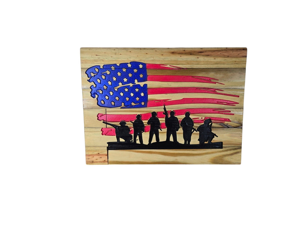 TK Wood Designs patriotic wooden wall art featuring a distressed American flag and a black silhouette of soldiers.