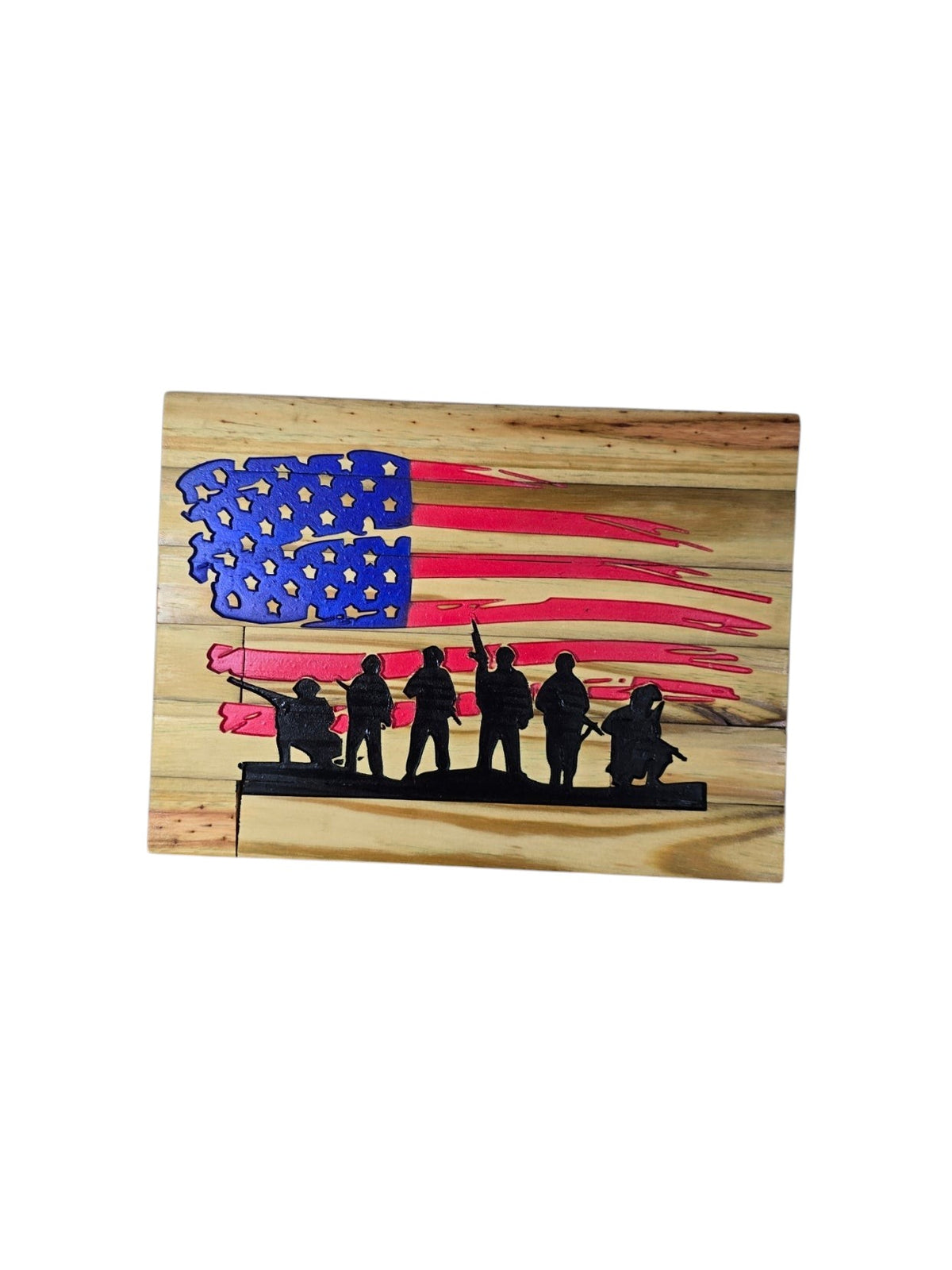 TK Wood Designs patriotic wooden wall art featuring a distressed American flag with soldier silhouettes in black.