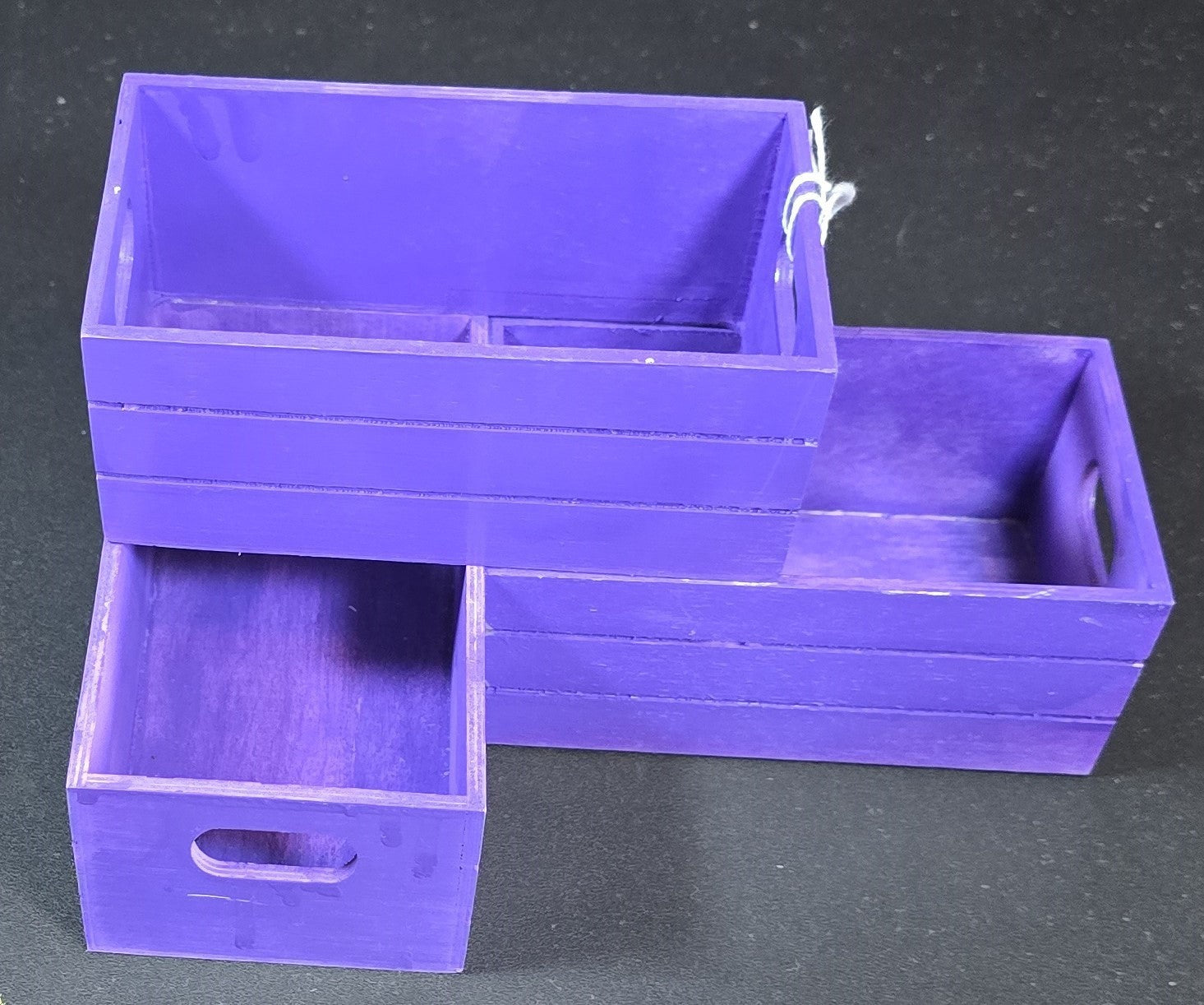TK Wood Designs set of 3 purple wooden crates with cut-out handles for storage and organization.