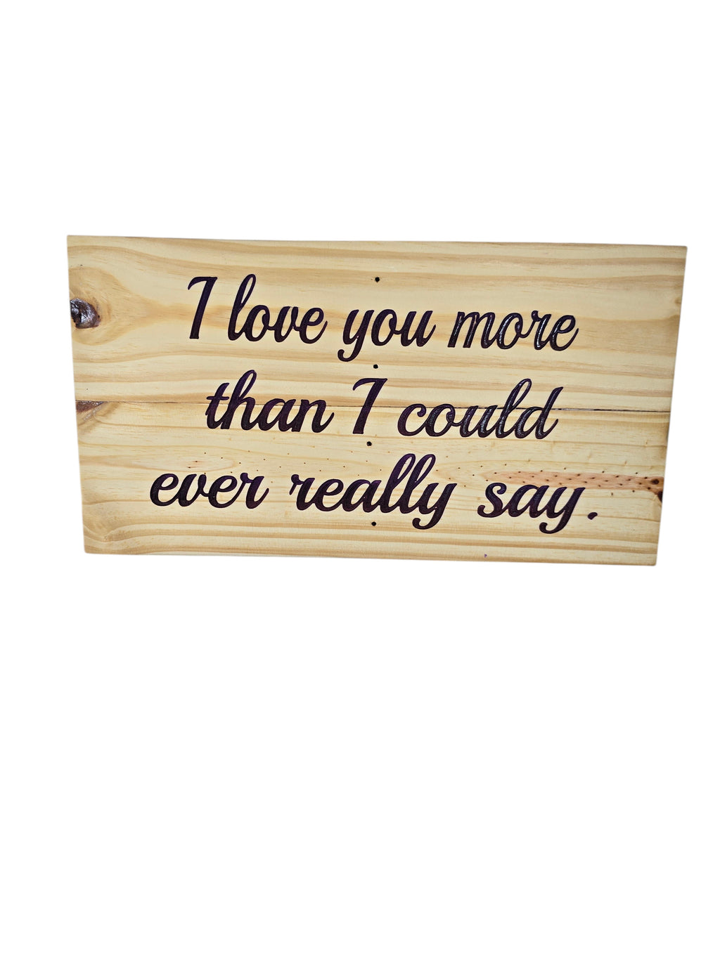 TK Wood Designs rustic reclaimed wood sign with hand-painted lettering saying "I love you more than I could ever really say."