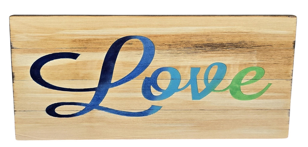 TK Wood Designs reclaimed wood sign with hand-airbrushed blue and green gradient 'Love' text. Natural wood grain visible.