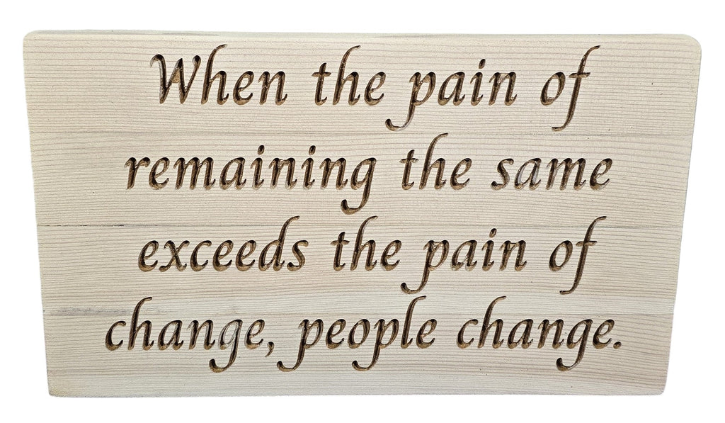 TK Wood Designs reclaimed wood sign with carved quote: "When the pain of remaining the same exceeds the pain of change, people change."