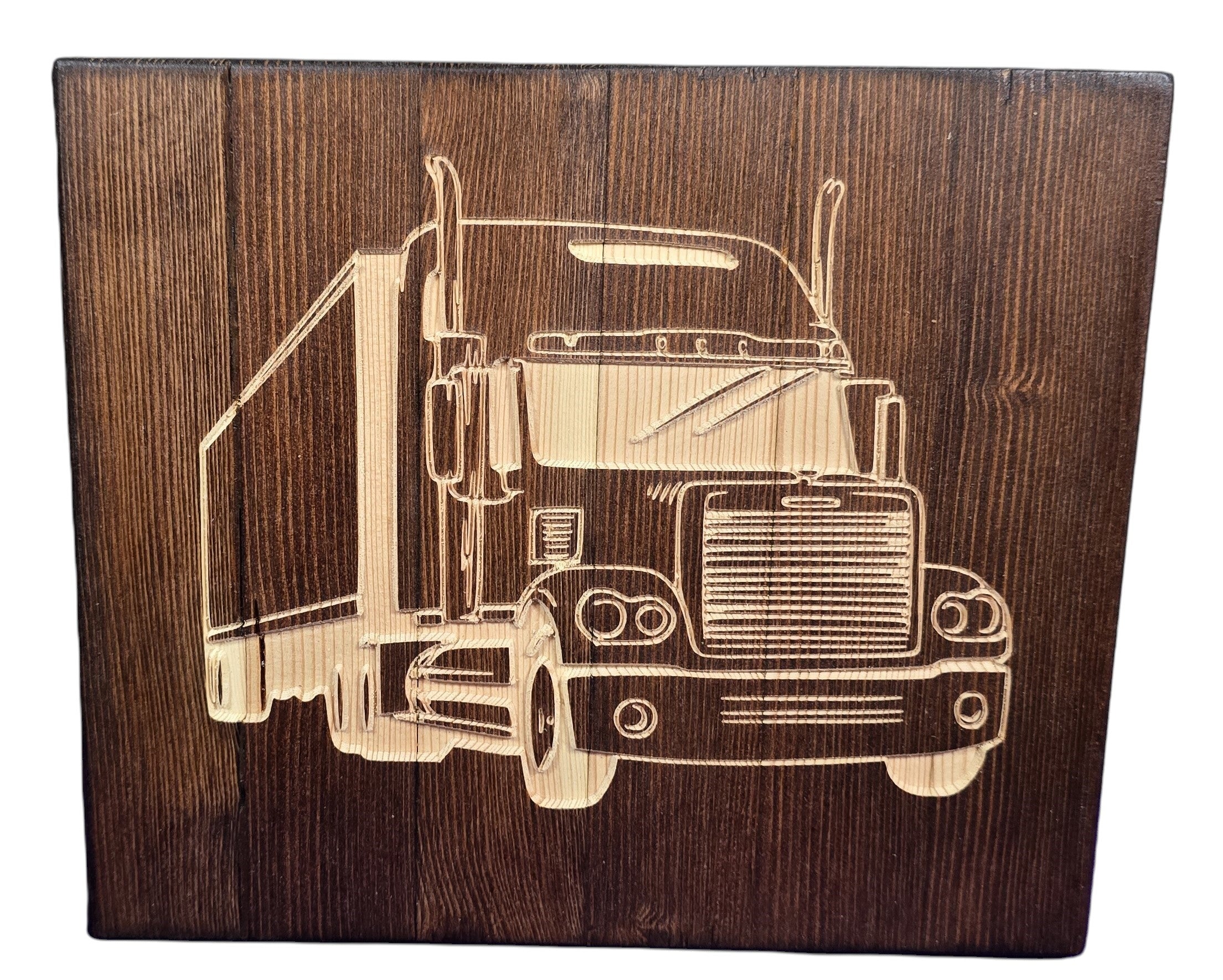TK Wood Designs handmade semi truck carving from reclaimed wood, featuring intricate details and rustic charm.