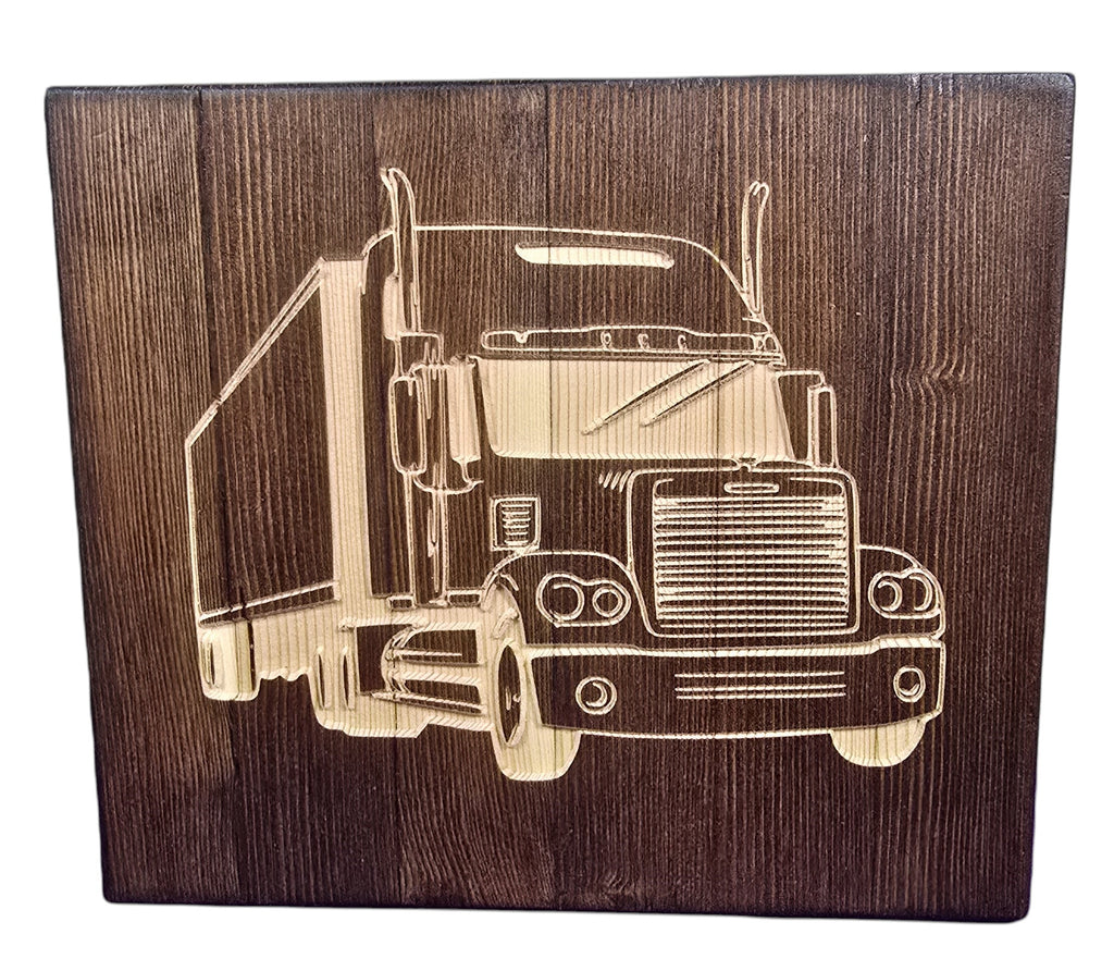 TK Wood Designs handmade semi truck carving from reclaimed wood, dark brown with natural grain.