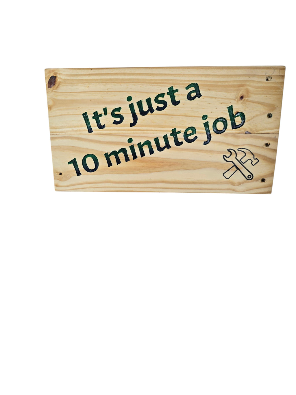 TK Wood Designs handmade reclaimed wood sign with hand-painted text "It's just a 10 minute Job" and a wrench/hammer graphic.