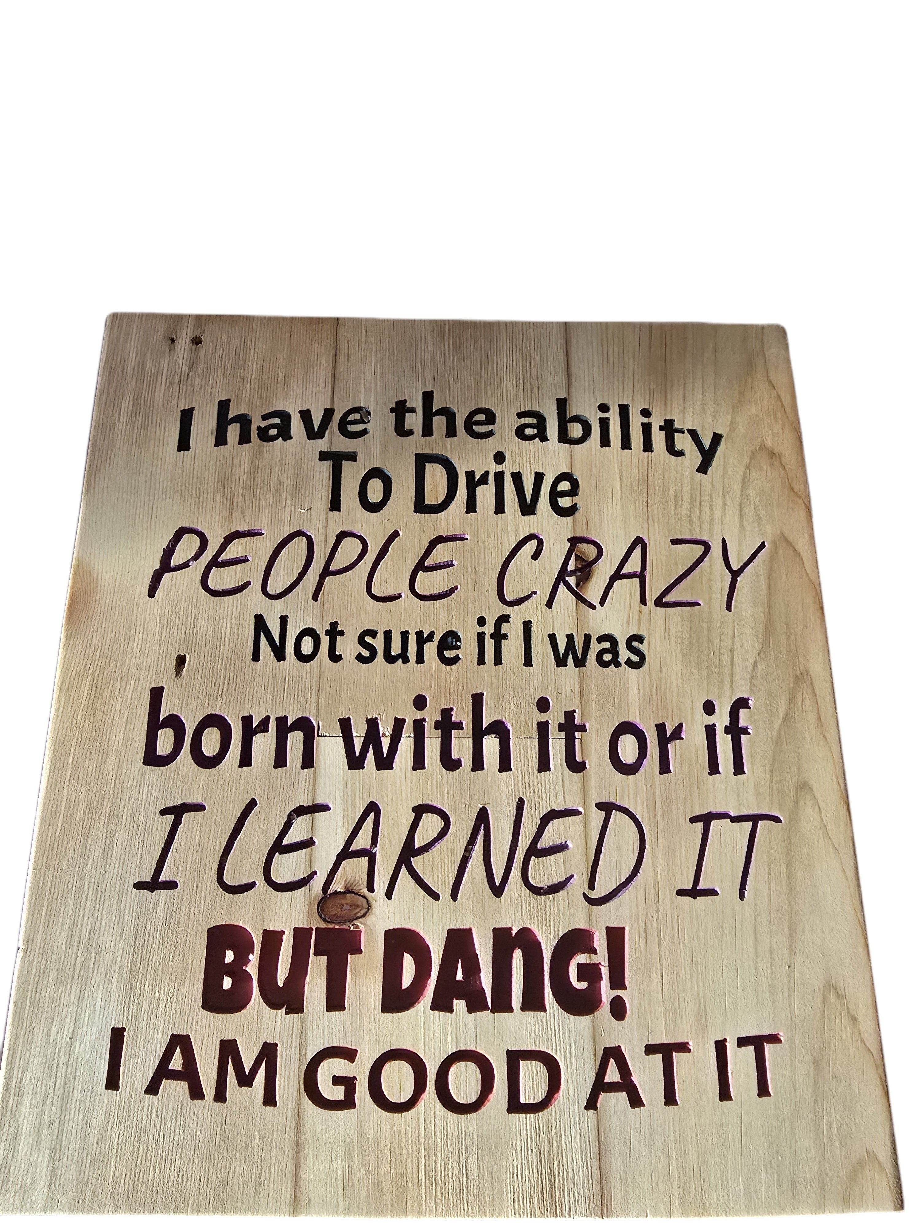 TK Wood Designs reclaimed wood sign with carved text: "I have the ability to drive people crazy, not sure if I was born with it or if I learned it BUT DANG! I AM GOOD AT IT."