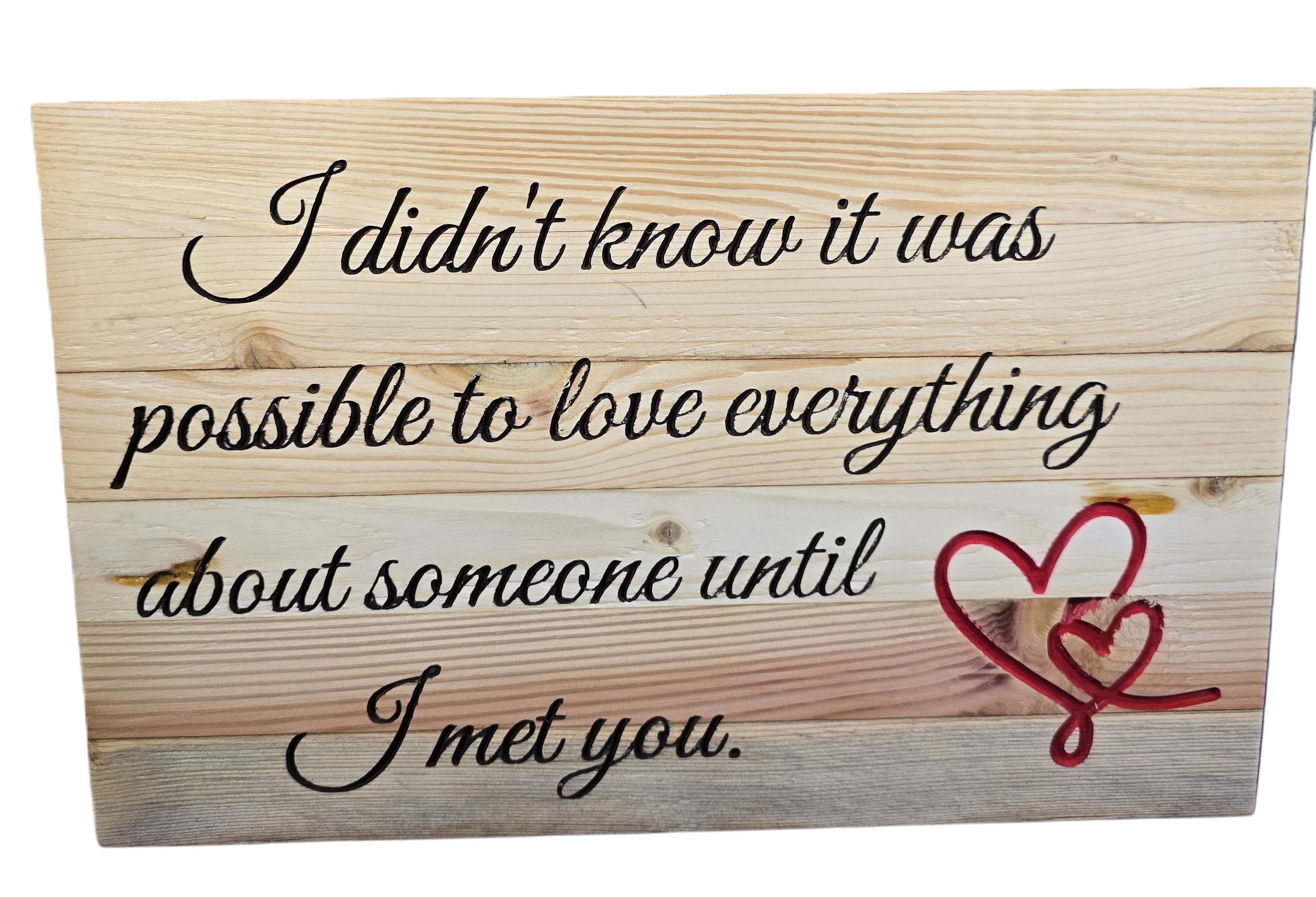TK Wood Designs reclaimed wood sign with hand-crafted lettering and red hearts. Features quote: "I didn't know it was possible to love everything about someone until I met you."