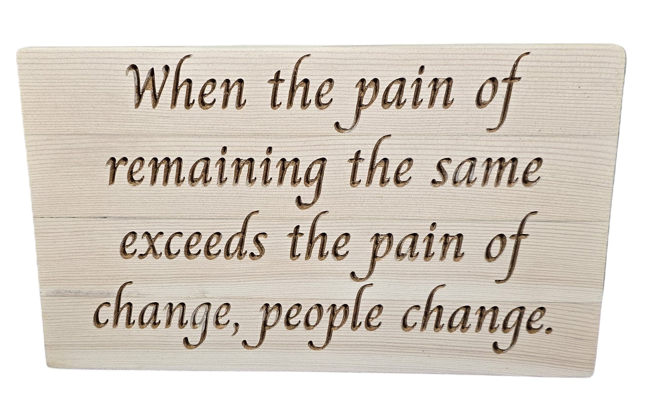 TK Wood Designs reclaimed wood sign with carved quote "When the pain of remaining the same exceeds the pain of change, people change."