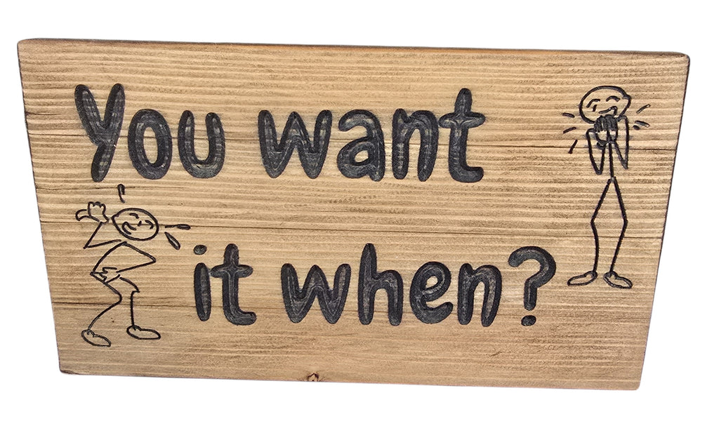 TK Wood Designs handmade reclaimed wood sign with witty hand-painted lettering "You want it when?" and stick figures.