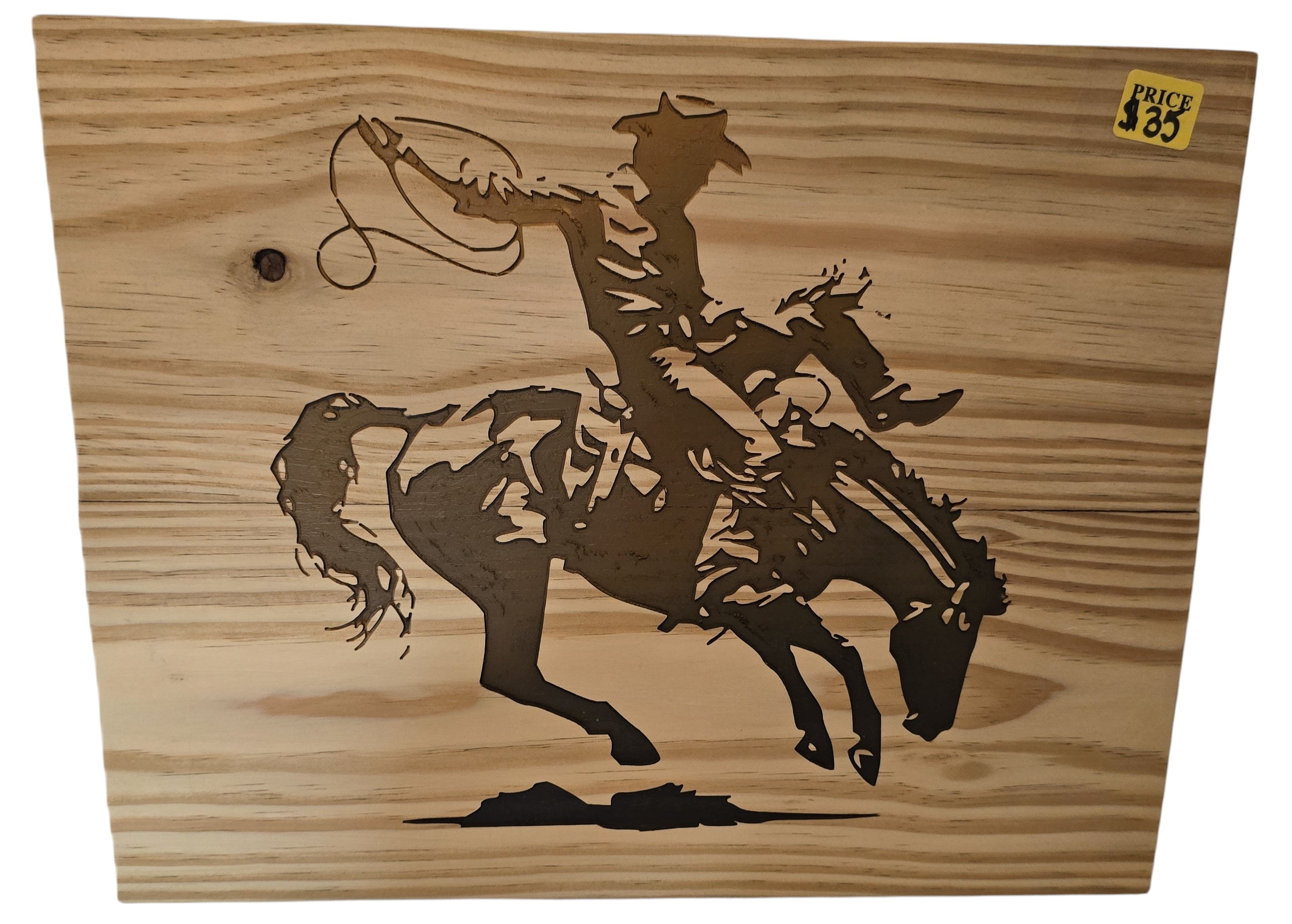 TK Wood Designs natural wood wall art featuring a cowboy on a bucking bronco silhouette. Rustic western decor.