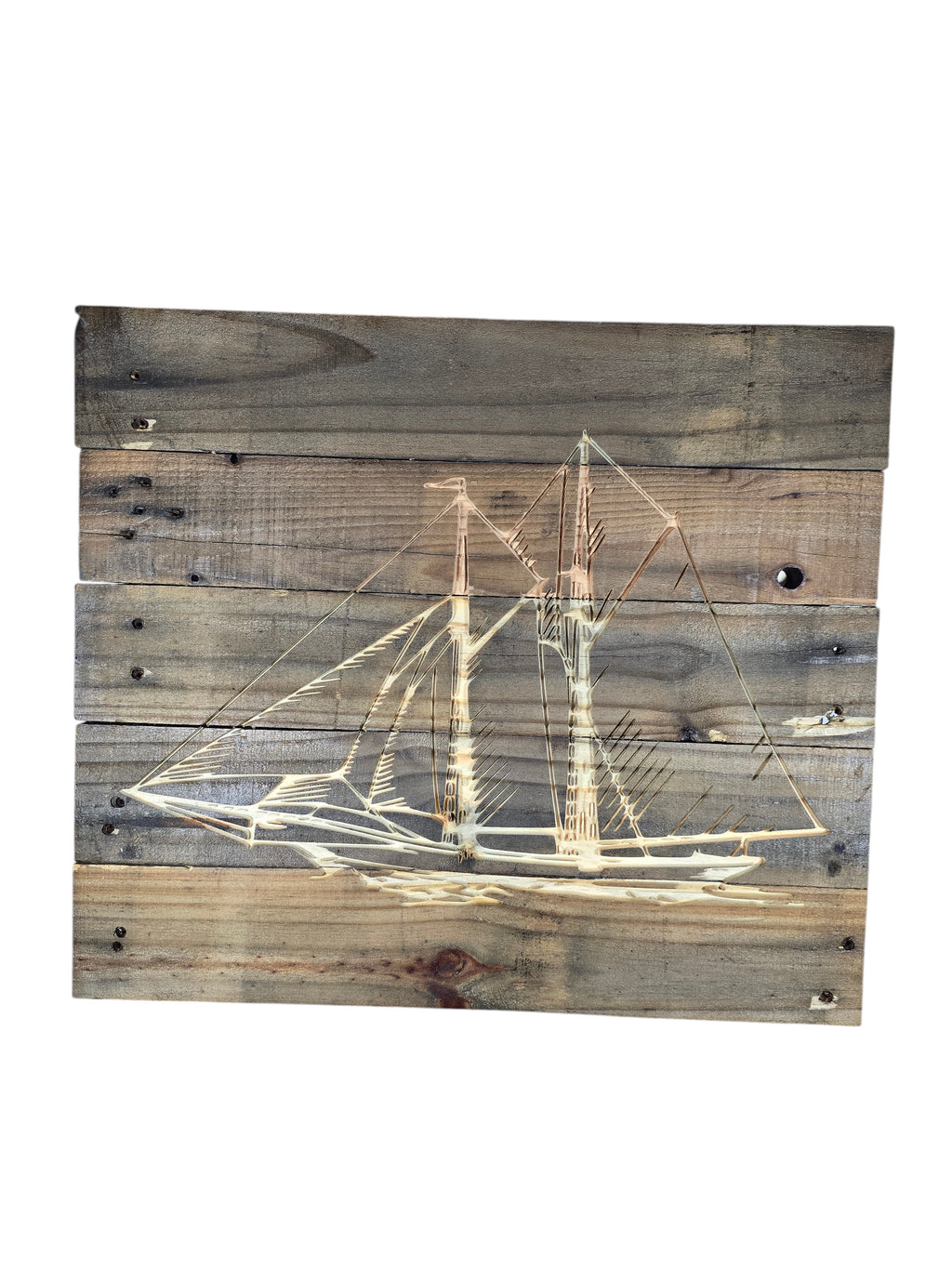 TK Wood Designs rustic wooden wall art featuring an etched sailboat design on weathered reclaimed wood planks.