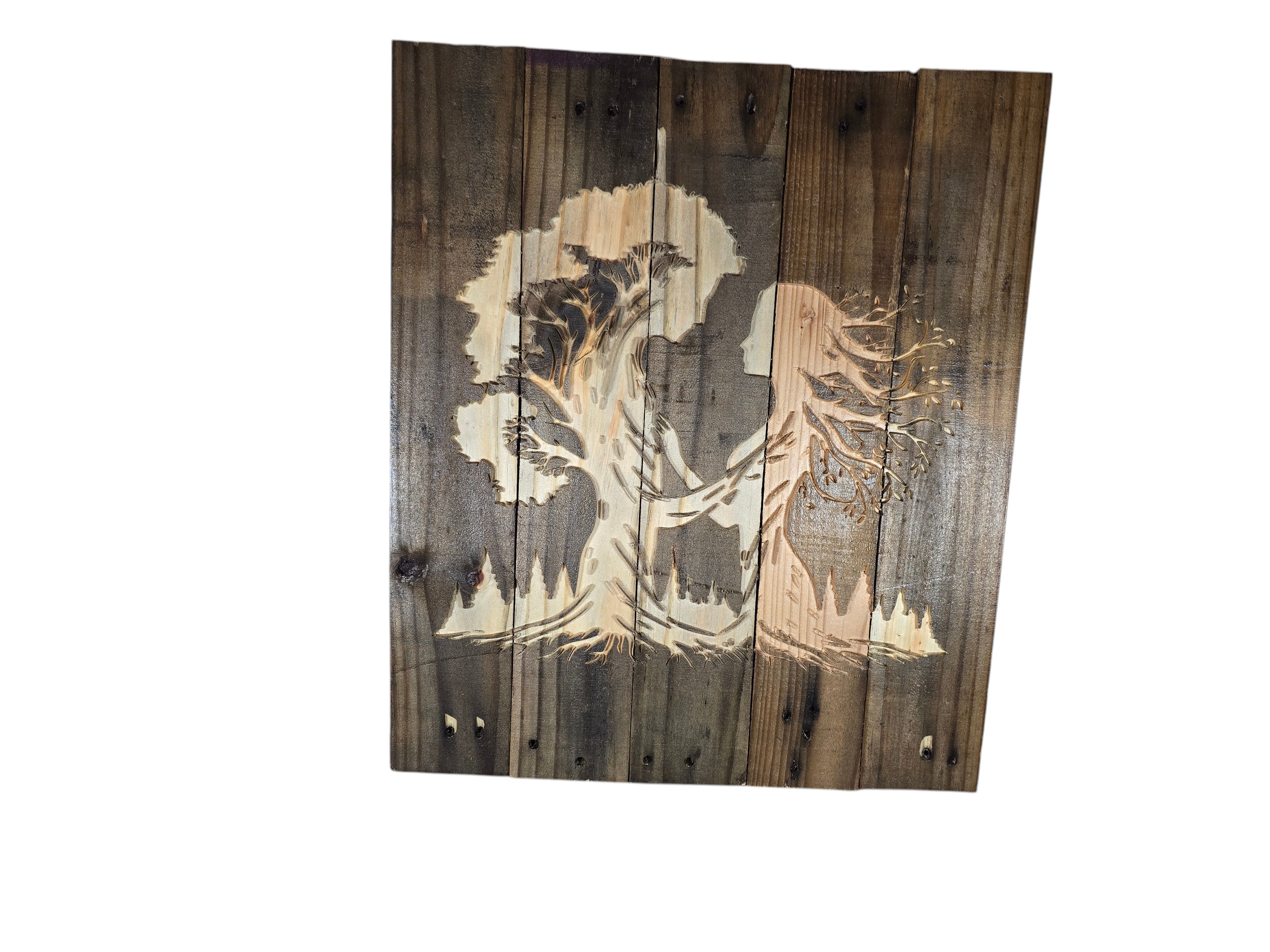 TK Wood Designs handcrafted rustic wall art featuring a laser-engraved silhouette of a person and tree on reclaimed wood.
