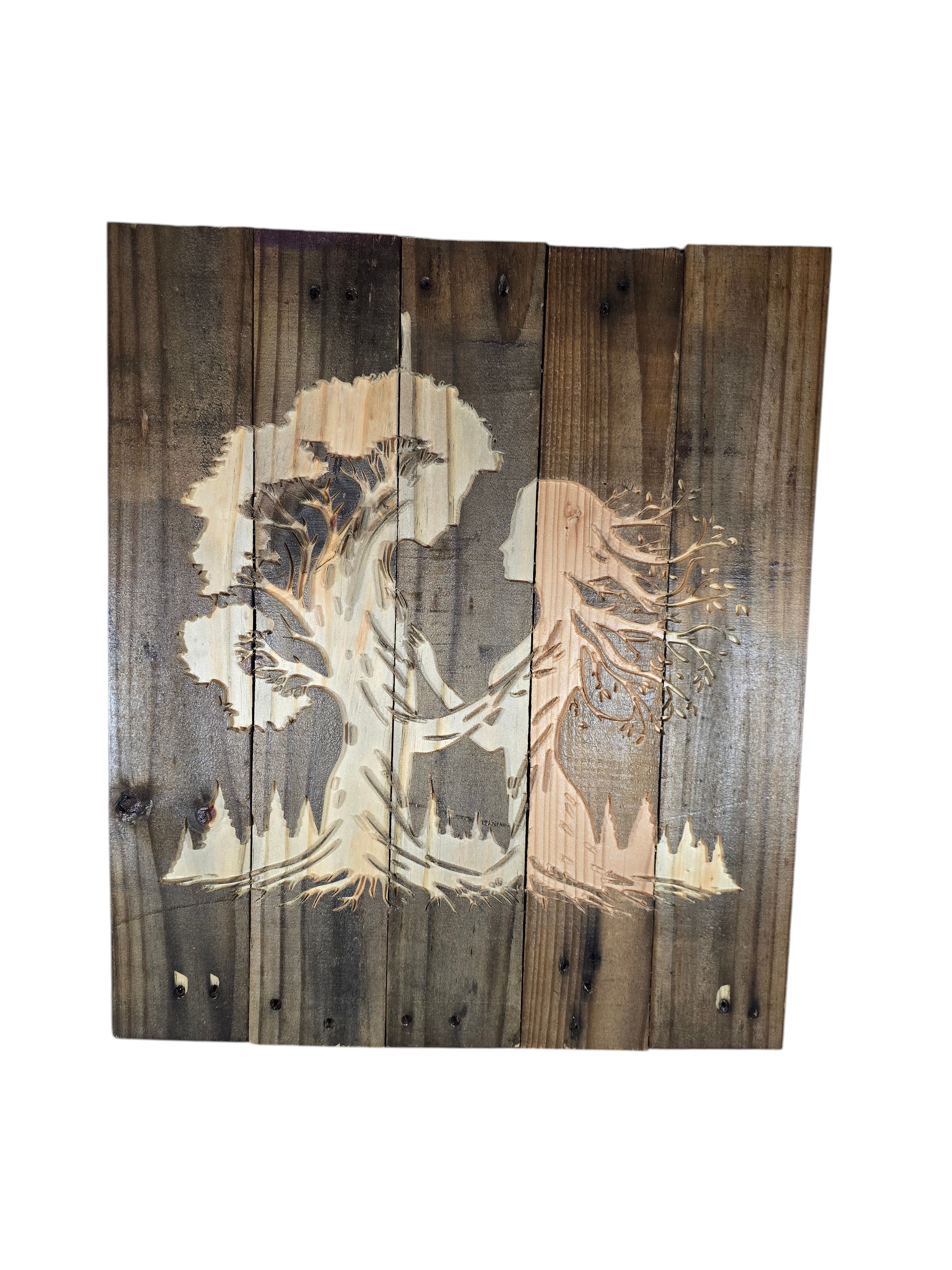 TK Wood Designs rustic wall art featuring a laser-engraved silhouette of a woman and tree on reclaimed weathered wood.