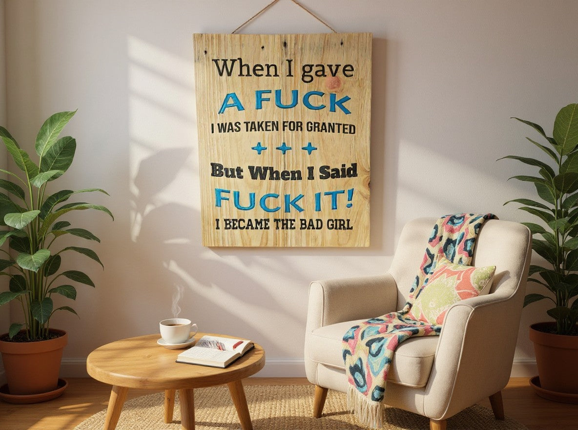 TK Wood Designs rustic wooden wall sign with sassy quote in black and blue lettering hanging in a cozy living room.