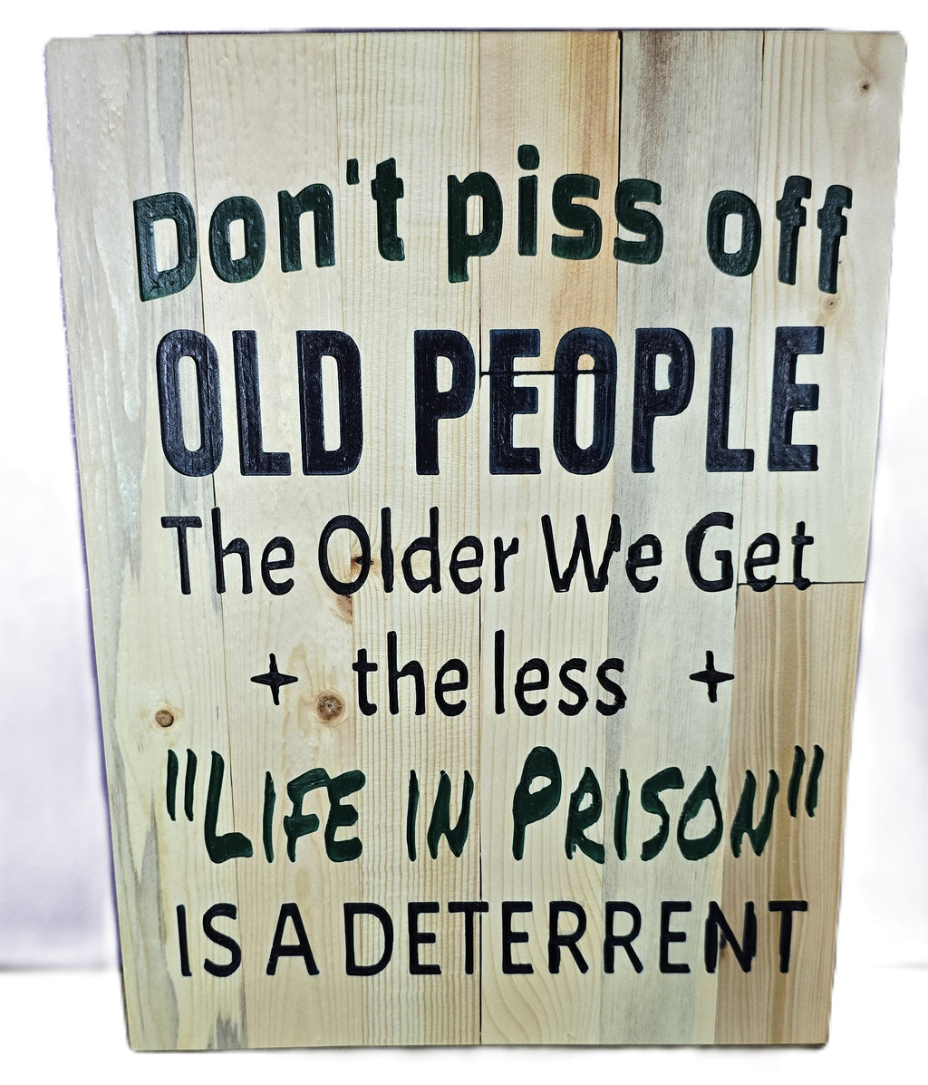 TK Wood Designs rustic salvaged wood sign with a humorous quote about old people and prison.
