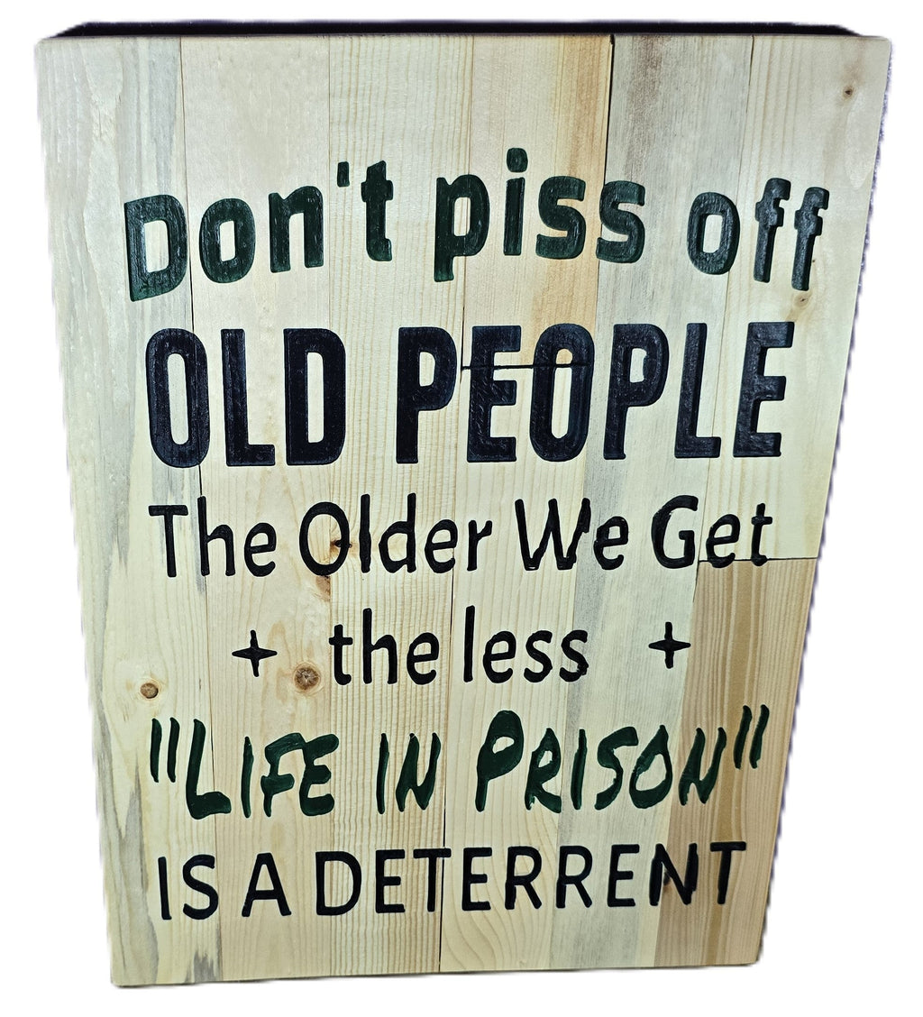 TK Wood Designs rustic salvaged wood sign with humorous quote: "Don't piss off old people. The older we get + the less "LIFE IN PRISON" is a deterrent."