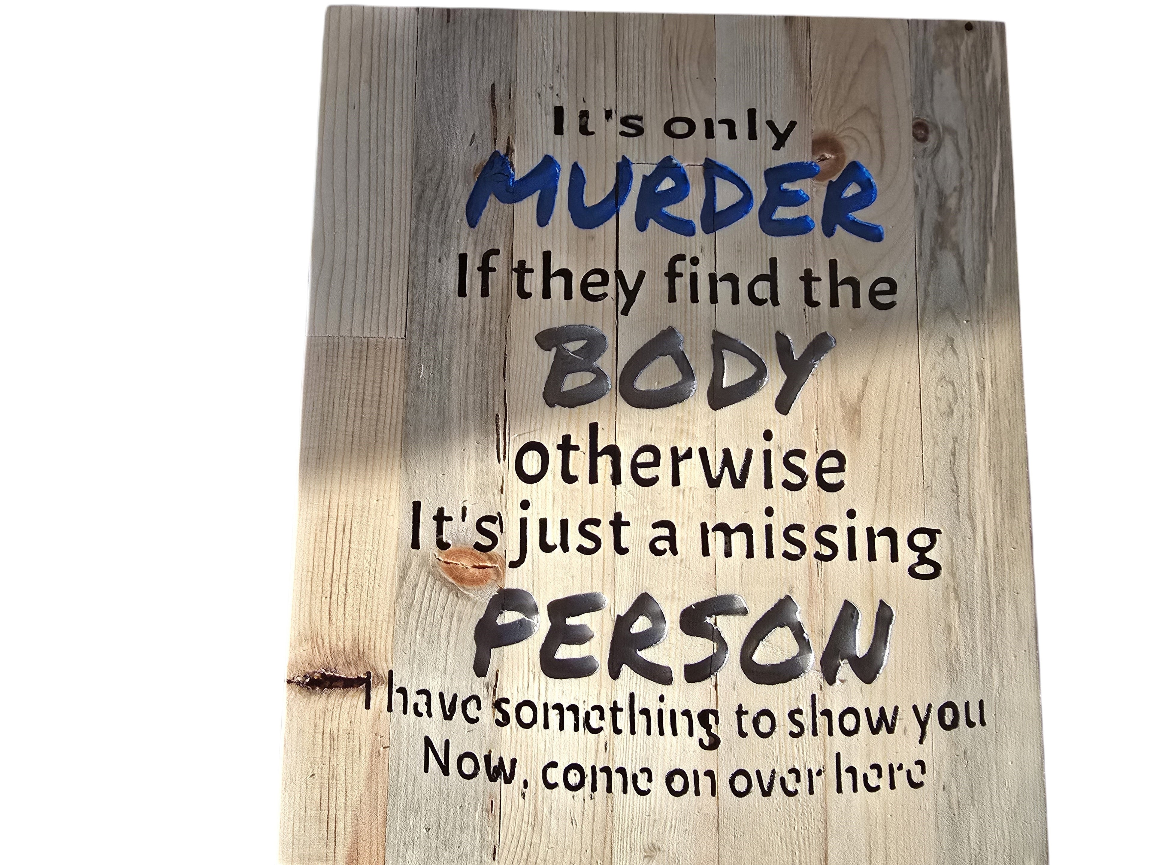 TK Wood Designs salvaged wood sign with humorous text about murder and missing persons. Rustic, weathered wood with black and blue lettering.