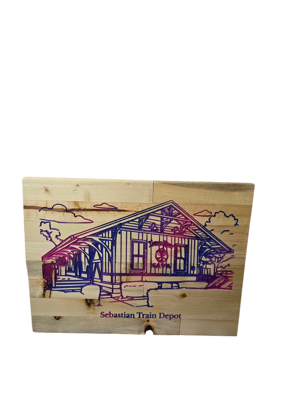 TK Wood Designs Sebastian Train Depot wood wall art with purple and blue accents on natural wood planks.