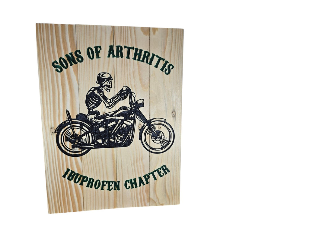 TK Wood Designs wooden sign featuring a skeleton riding a motorcycle with Sons of Arthritis Ibuprofen Chapter text