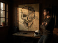 TK Wood Designs skull typography engraved wooden wall art featuring a safety message for bikers in a rustic workshop.