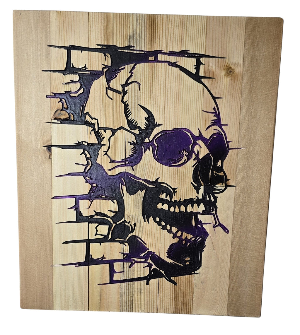 TK Wood Designs wooden wall art featuring a black and purple skull design with a distressed, ripped effect.