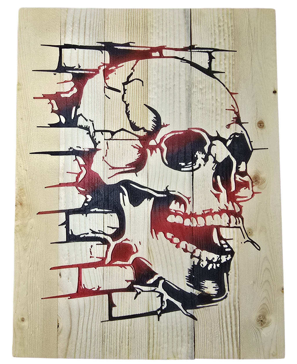 TK Wood Designs rustic skull wall art on wood planks with distressed brick effect in black and red.