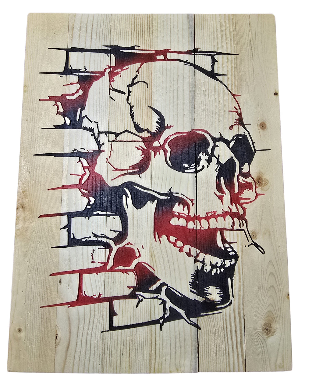 TK Wood Designs rustic skull wood wall art with distressed brick effect in black and red on natural wood planks.