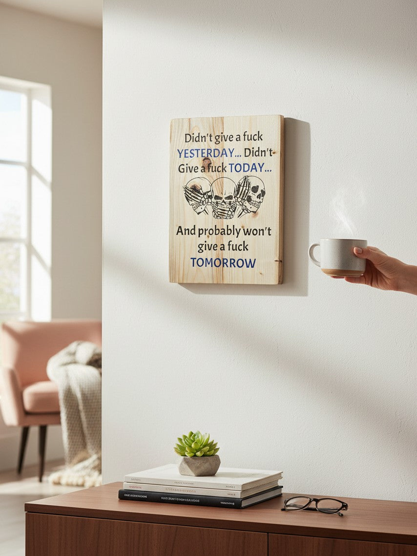 TK Wood Designs rustic wooden wall sign featuring three skulls and bold text with blue accents on a white wall.