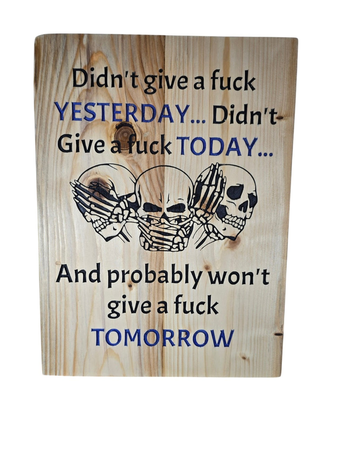 TK Wood Designs rustic wooden wall sign featuring three skulls and bold text with blue accents for alternative decor.