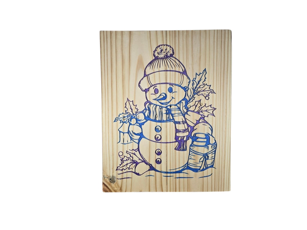 TK Wood Designs decorative wooden wall plaque featuring an iridescent line-art snowman illustration for the holidays.