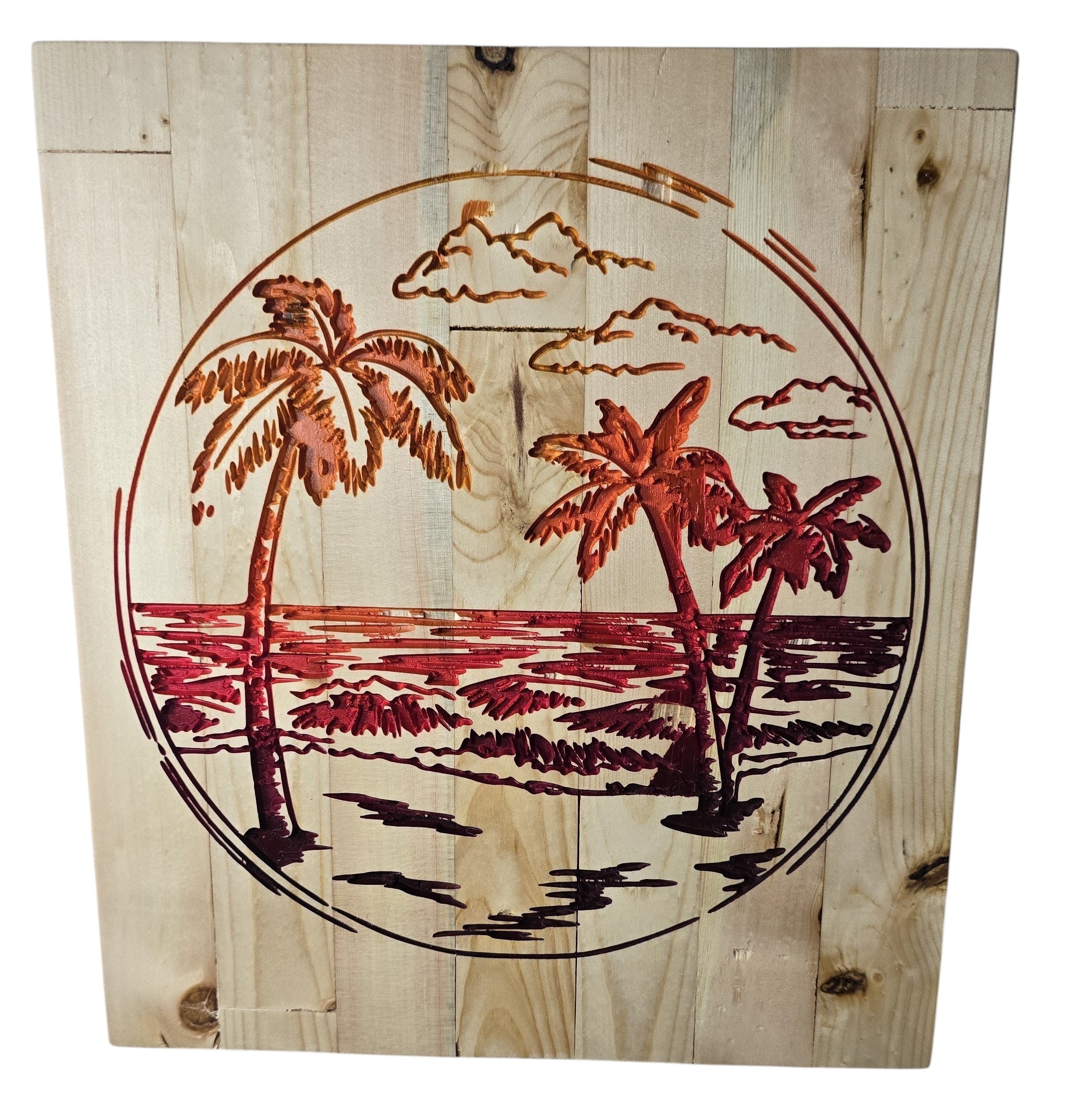 TK Wood Designs wood carving of a sunset beach scene with palm trees and clouds, featuring red and orange tones.