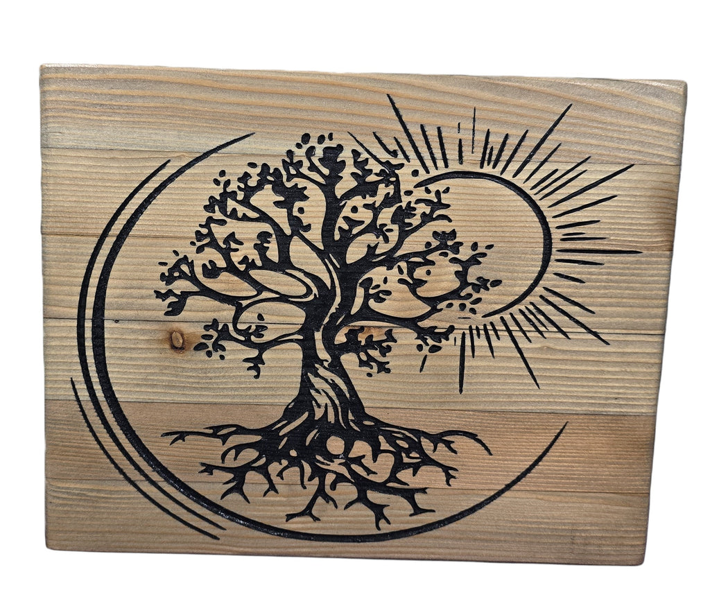 TK Wood Designs handcrafted reclaimed wood sculpture of a black Tree of Life with roots and a sunburst, symbolizing growth and renewal.