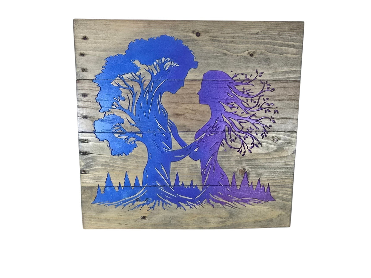 TK Wood Designs handcrafted wooden wall art featuring a mystical tree spirit silhouette with blue and purple gradient