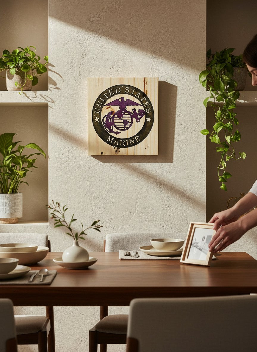 TK Wood Designs United States Marine Corps emblem carved into light-colored wood with a dark border and purple eagle.