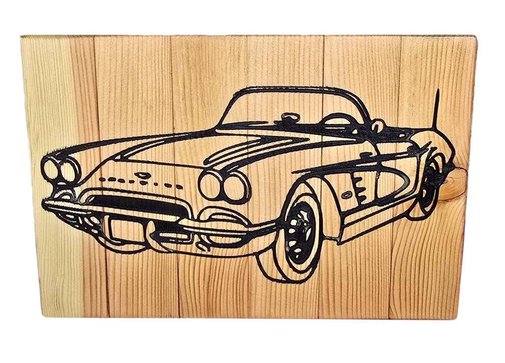 TK Wood Designs vintage sports car wood carving wall art. Detailed black outline on natural wood.