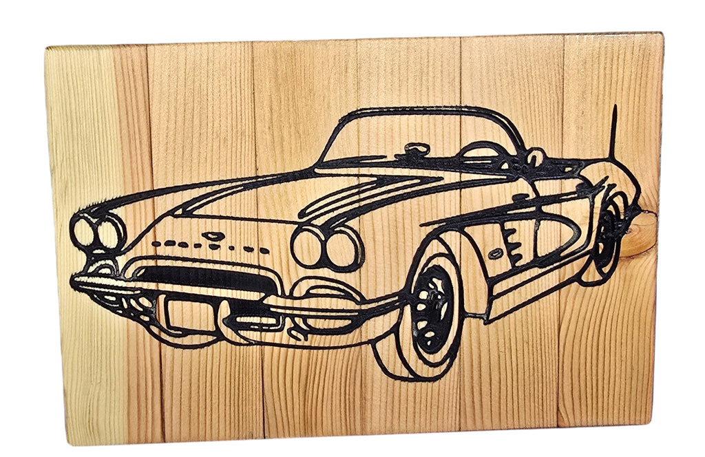 TK Wood Designs vintage sports car wood carving wall art. Detailed black outline on natural wood.