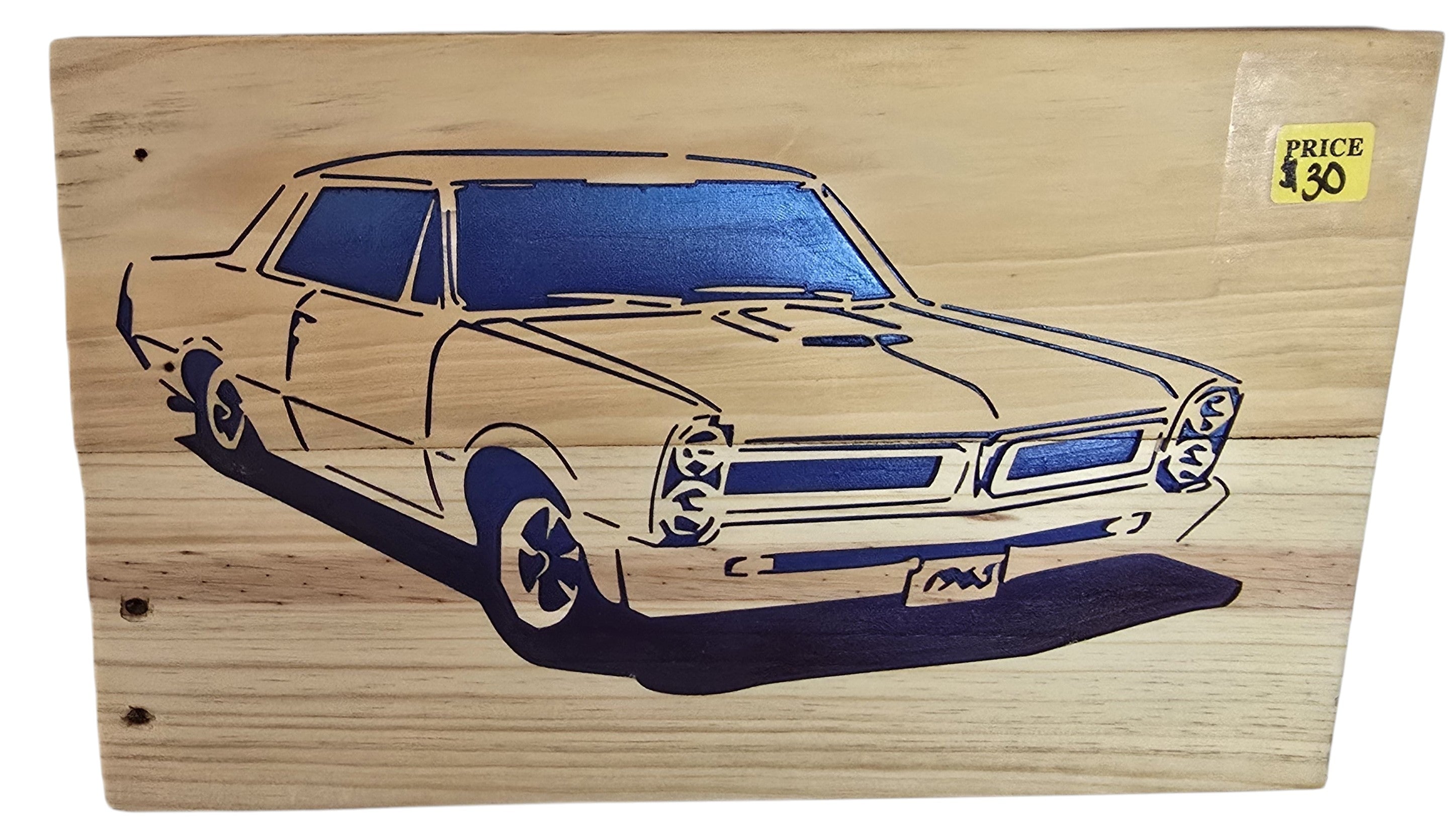 TK Wood Designs natural wood wall art featuring a vintage car silhouette with blue accents. Rustic automotive decor.
