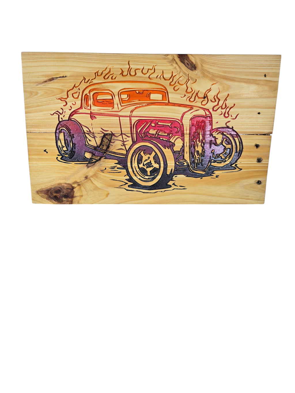 TK Wood Designs vintage hot rod wood art with flames, featuring a classic coupe in orange, red, and purple hues on natural wood.
